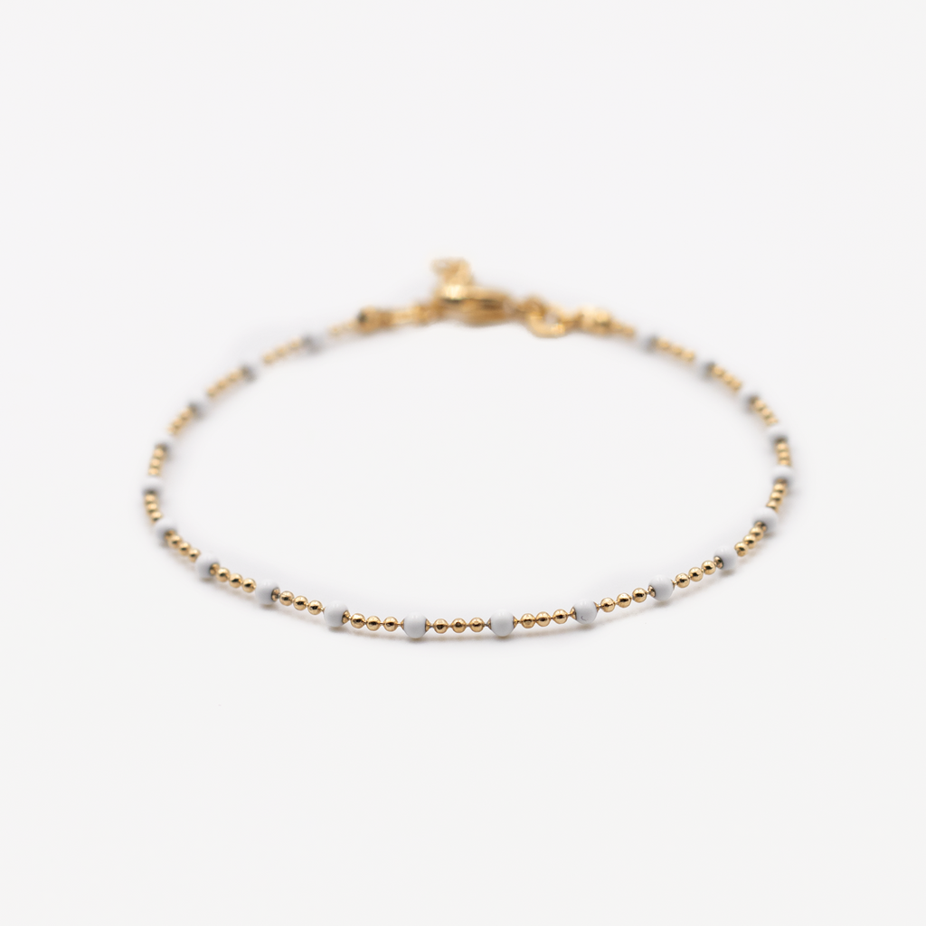 bracelet perles blanches plaqué or
